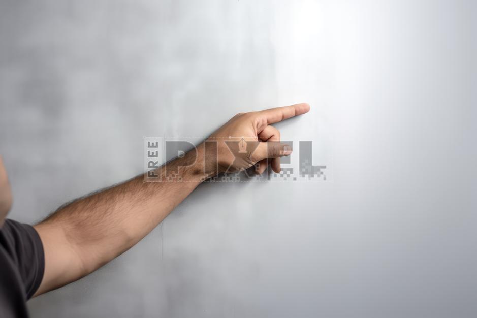 Free Photos - Pointer Finger Gesturing Towards A White Wall | FreePixel.com