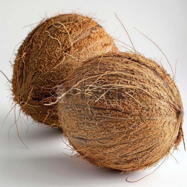 Free Photos - Two Coconuts Lying Next To Each Other On A Clean, Grey ...