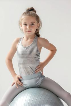 Free Photos - Adorable Blonde Little Girl Sitting On Exercise Ball In Green  Workout Dress Photo. | FreePixel.com